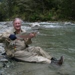 NZ Fly Fishing Expeditions - NZ rainbow and a happy client