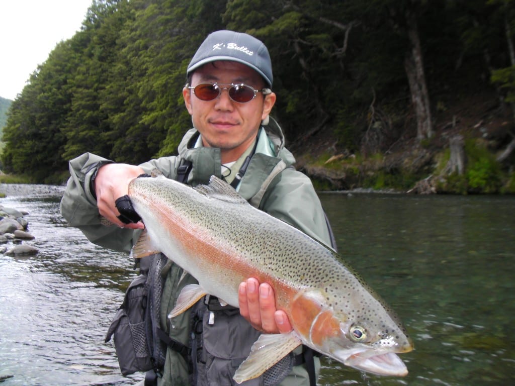 Fly fishing near Queenstown New Zealand in stormy weather Fly Fishing