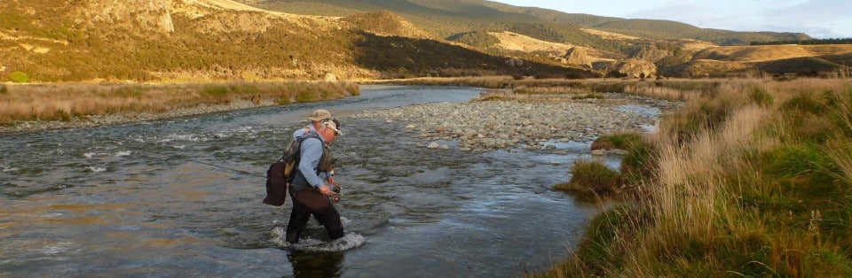 Fly fishing Queenstown in the heat of  New Zealand summer